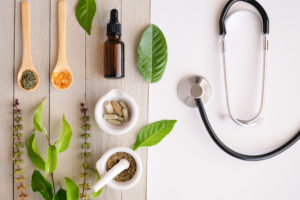 Stethoscope and medicinal herbs
